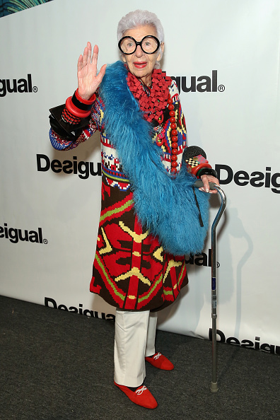 NEW YORK, NY - SEPTEMBER 10:  Businesswoman Iris Apfel poses backstage at the Desigual fashion show during Spring 2016 New York Fashion Week: The Shows at The Arc, Skylight at Moynihan Station on September 10, 2015 in New York City.  (Photo by Cindy Ord/Getty Images for NYFW: The Shows)