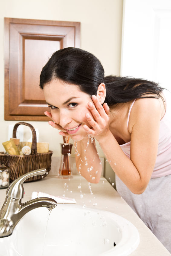 Woman washing face